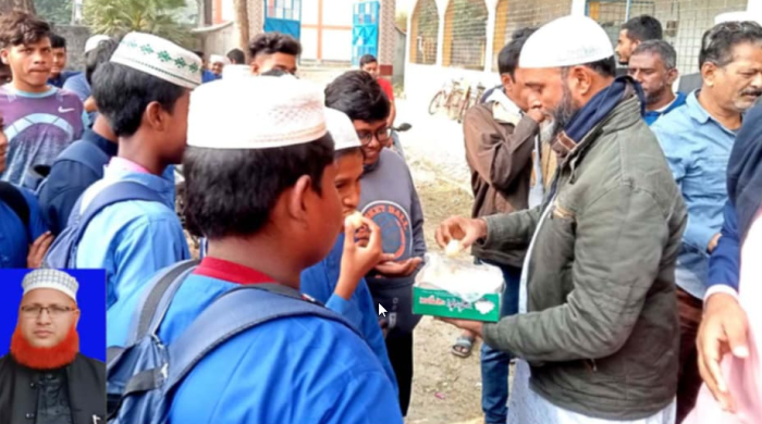 দুপুচাঁচিয়ায় মাদ্রাসা অধ্যক্ষ মোস্তাফিজুর রহমান সাময়িক বরখাস্ত, শিক্ষক-শিক্ষার্থীদের মিষ্টি বিতরণ